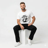 White t-shirt with panda graphic and 'Built Different' text on a beige background