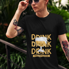 Person wearing a black t-shirt with a graphic and text, standing outdoors.