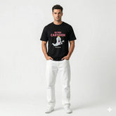 Man wearing a black t-shirt with 'Retro Cartoon' design on a white background