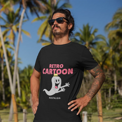 Man wearing a black t-shirt with a cartoon ghost design and text in a tropical setting