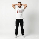 Man wearing a white t-shirt with text design on a plain background