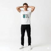 Man wearing a white t-shirt with text and graphics, standing against a plain background