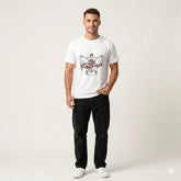 Man wearing a white t-shirt with a graphic design on a plain background