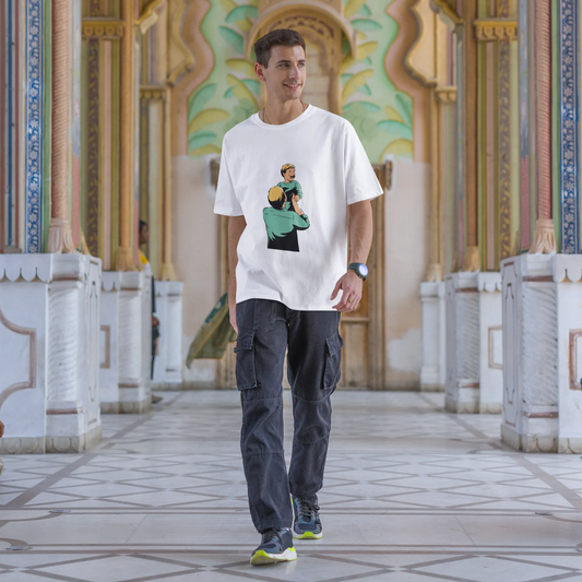 Man wearing a white t-shirt with a graphic design in an ornate architectural setting