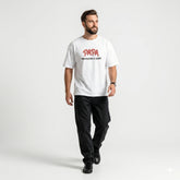 Man wearing a white t-shirt with 'PAPA' text on a plain background