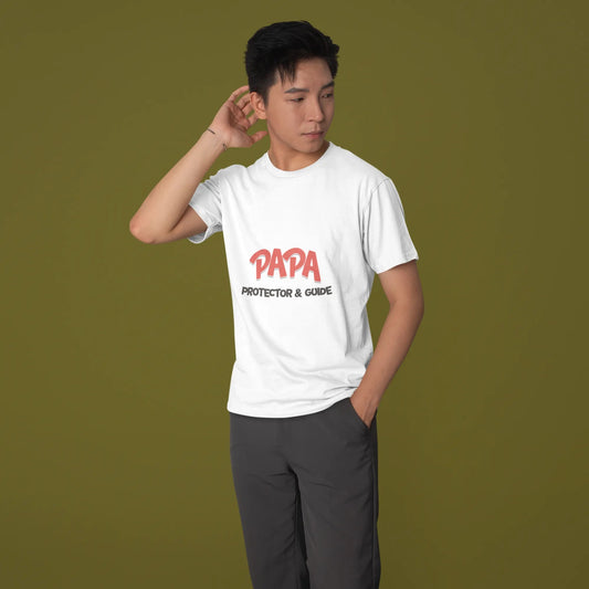 Person wearing a white t-shirt with red text on a green background