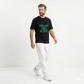 Man wearing a black t-shirt with 'Work Hard and Be Nice' text on a white background
