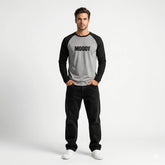Man wearing a gray and black long-sleeve shirt with 'MOODY' text on a white background