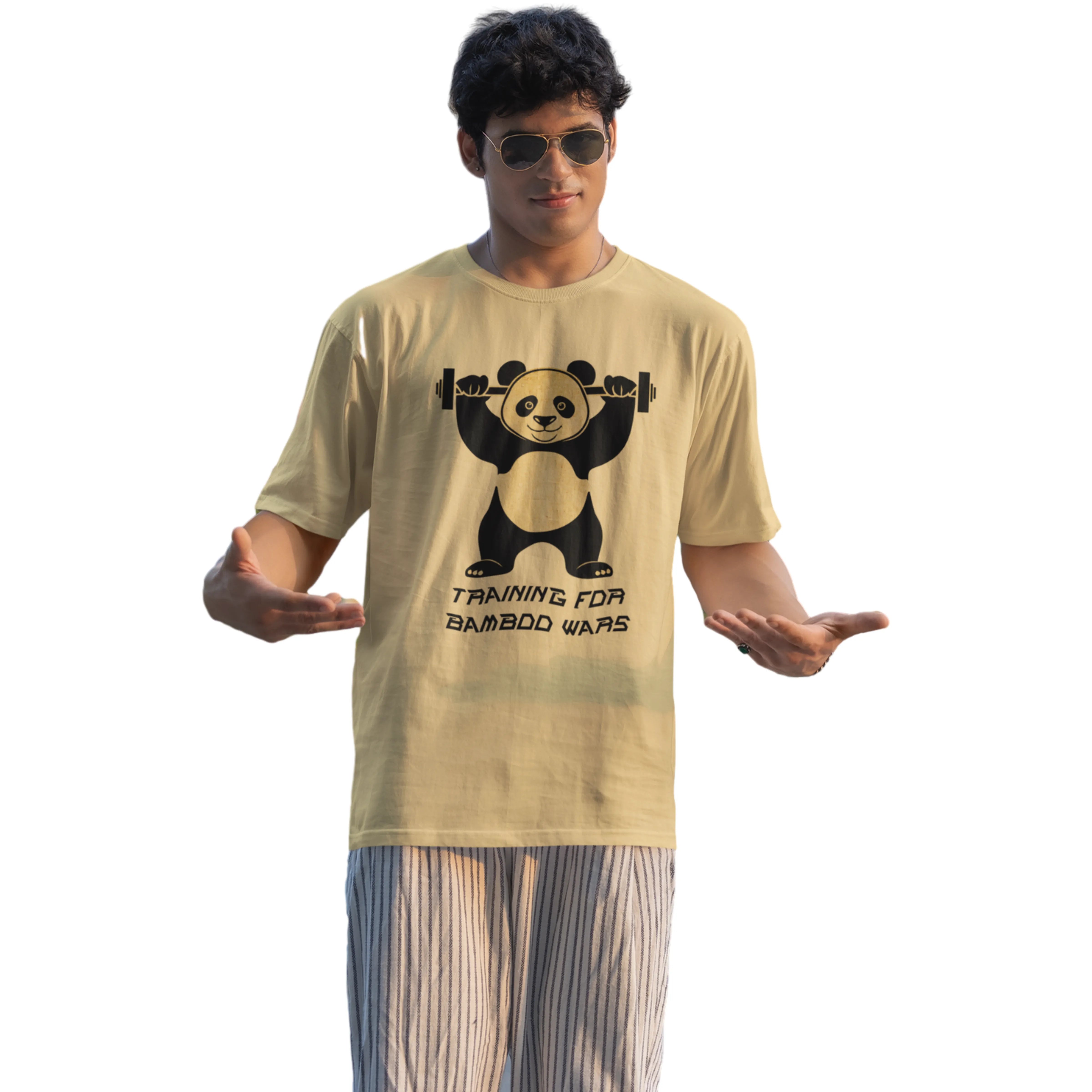 Man wearing a beige t-shirt with a panda graphic and text on a white background