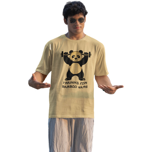 Man wearing a beige t-shirt with a panda graphic and text on a white background