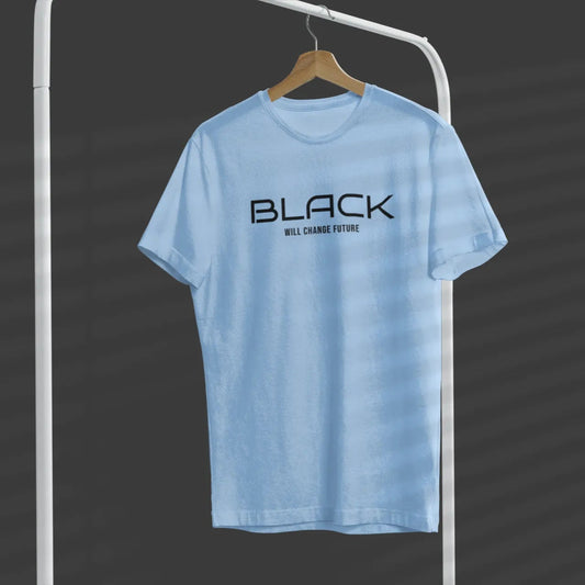 Light blue t-shirt with black text on a hanger against a dark background