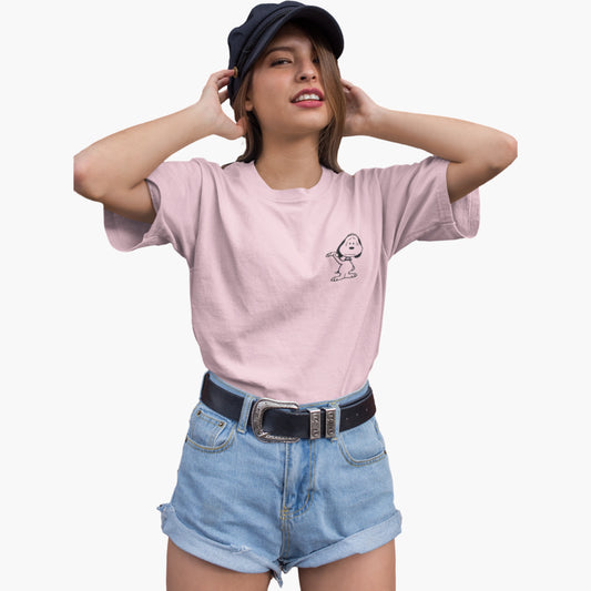 Woman wearing a pink t-shirt with a graphic design, blue shorts, and a cap on a white background
