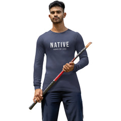 Man wearing a dark blue 'NATIVE' shirt holding a sword on a white background