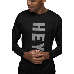 Man wearing a black long-sleeve shirt with 'HEY' printed on it against a white background