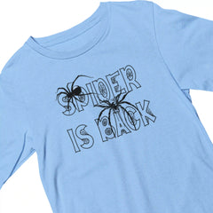 Light blue t-shirt with black spider graphic and 'SPIDER IS BACK' text on a white background