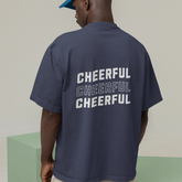 Person wearing a navy t-shirt with 'CHEERFUL' text on the back, standing against a plain background.