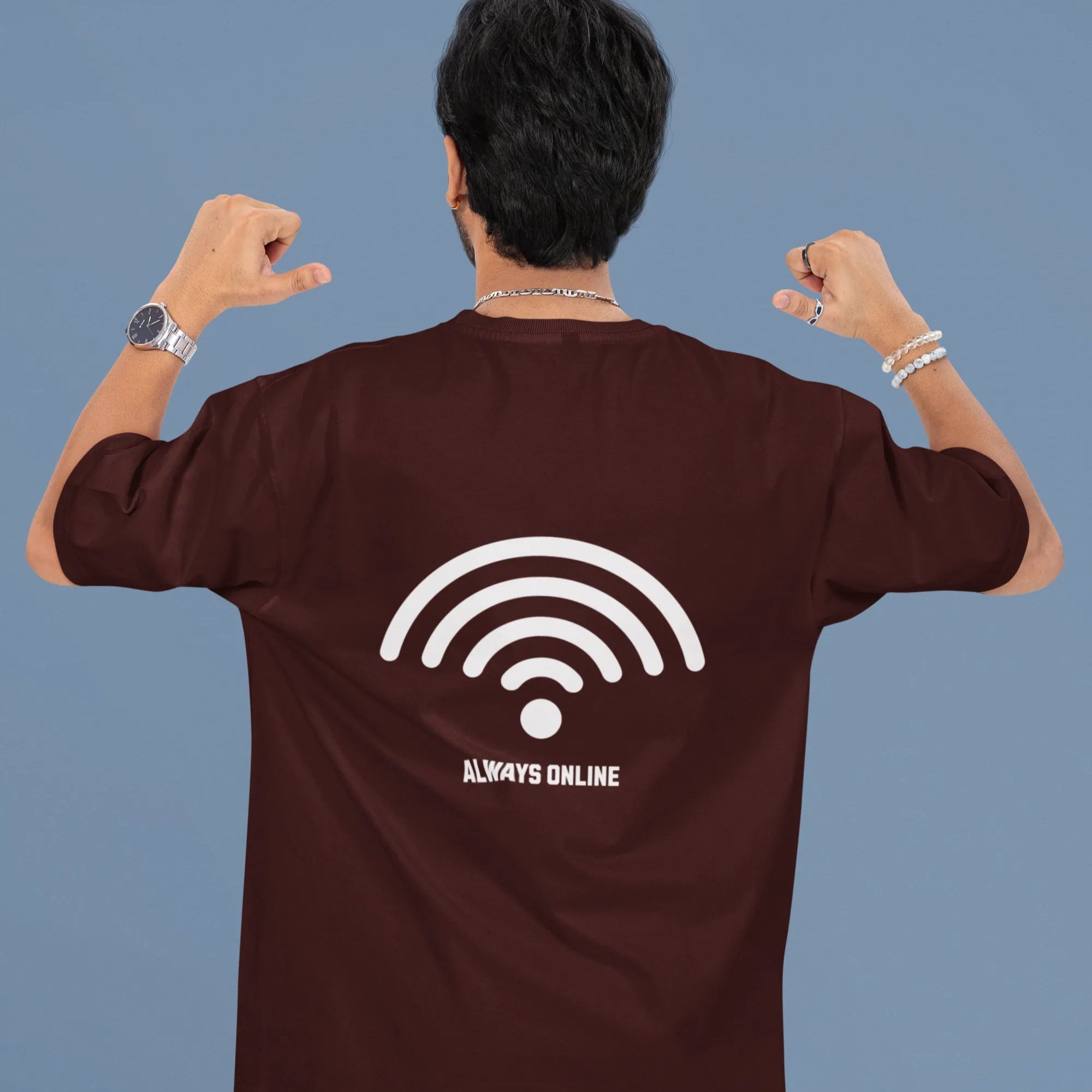 Person wearing a brown t-shirt with a Wi-Fi symbol and 'Always Online' text on the back, against a plain background.