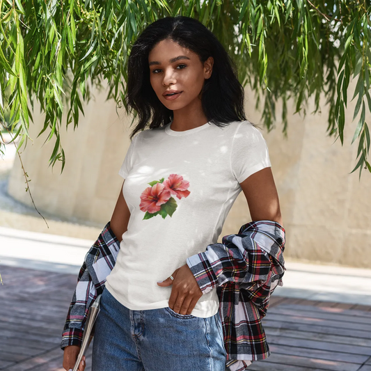 Woman wearing a white t-shirt with a floral design outdoors