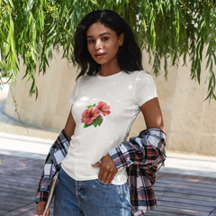 Woman wearing a white t-shirt with a floral design outdoors