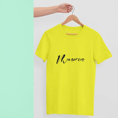 Yellow t-shirt with 'Memories' text on a hanger against a light green background