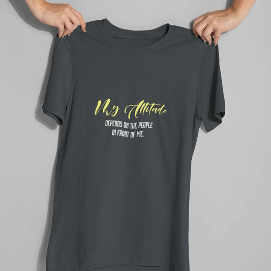 Black t-shirt with yellow text held by a person on a gray background