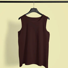 Brown sleeveless top on a hanger against a beige background