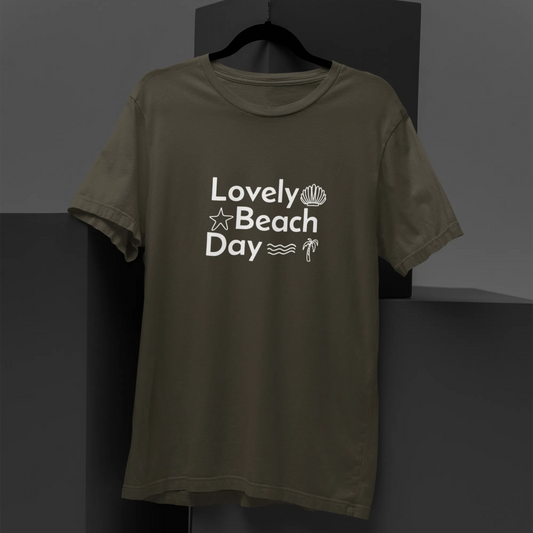Green t-shirt with 'Lovely Beach Day' text on a black background