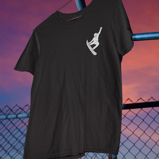 Black t-shirt with a white graphic on a metal pole against a sunset sky.