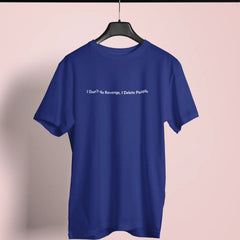 Blue t-shirt with text on a hanger against a pink background
