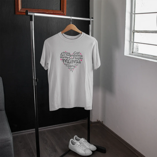 White t-shirt with text on a hanger in a room with a window.