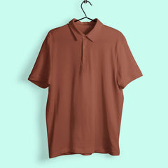 Brown polo shirt on a hanger against a light blue background