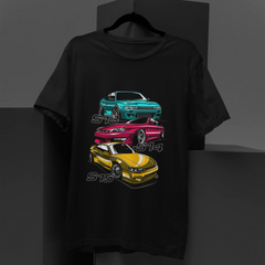 Black t-shirt with car graphics on a dark background