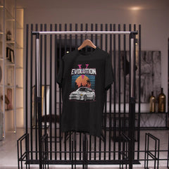 Black t-shirt with graphic design hanging on a rack in a store setting