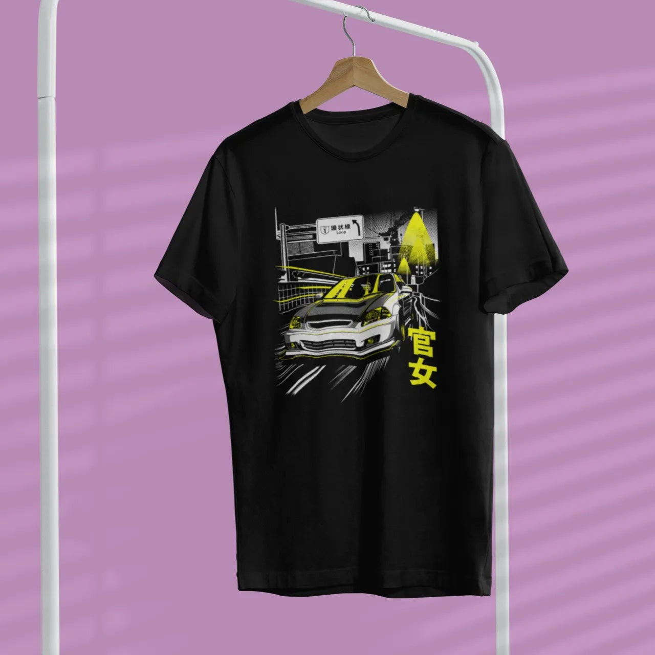 Black t-shirt with graphic design on a hanger against a purple background