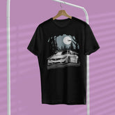 Black t-shirt with car graphic on a hanger against a purple background