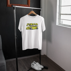 White t-shirt with a graphic design on a hanger in a room with a window.