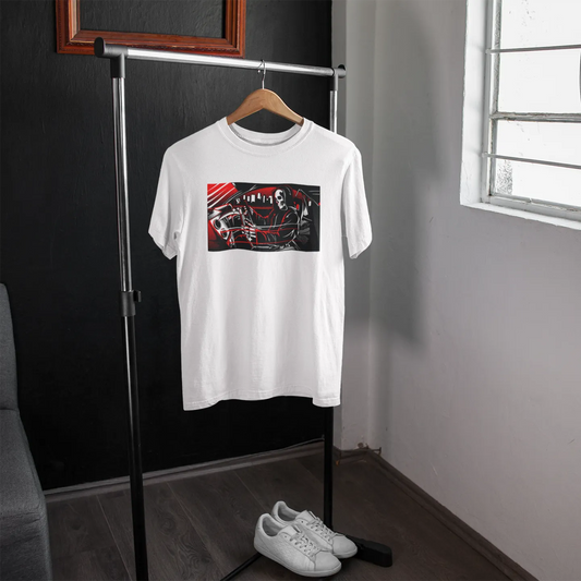 White t-shirt with a graphic design on a hanger in a room with a window.