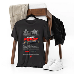 Black t-shirt with technical design on a chair with jeans and sneakers.