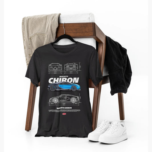 Black t-shirt with Bugatti Chiron design on a wooden chair with jeans and sneakers.