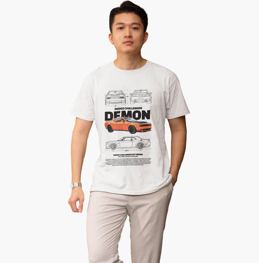 Person wearing a white t-shirt with a Dodge Challenger Demon graphic design on a white background