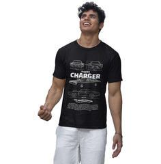 Man wearing a black t-shirt with a Dodge Charger graphic design on a white background
