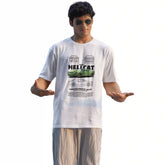 Person wearing a white t-shirt with a graphic design on a white background
