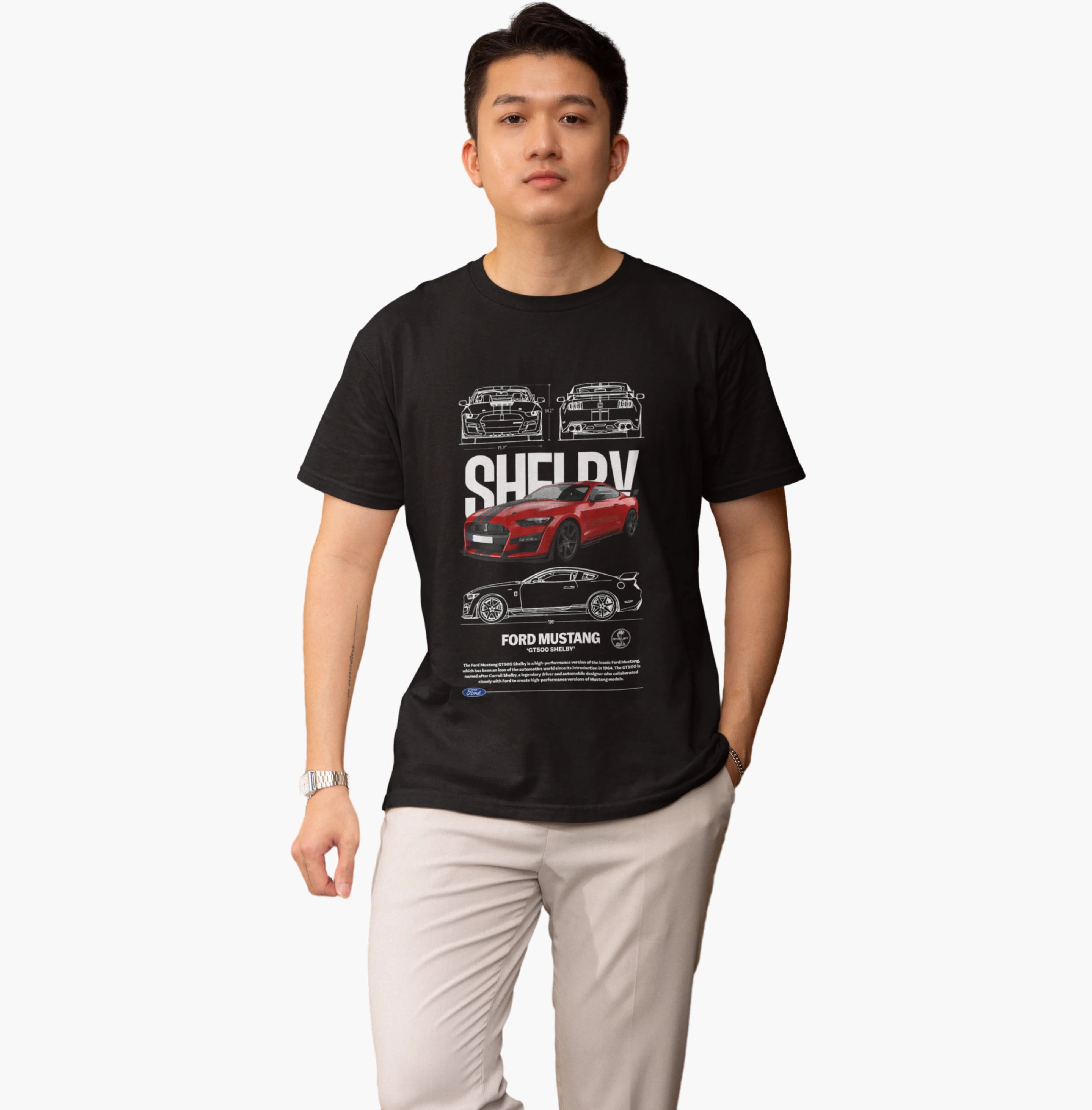 Person wearing a black t-shirt with Shelby Mustang graphics on a white background