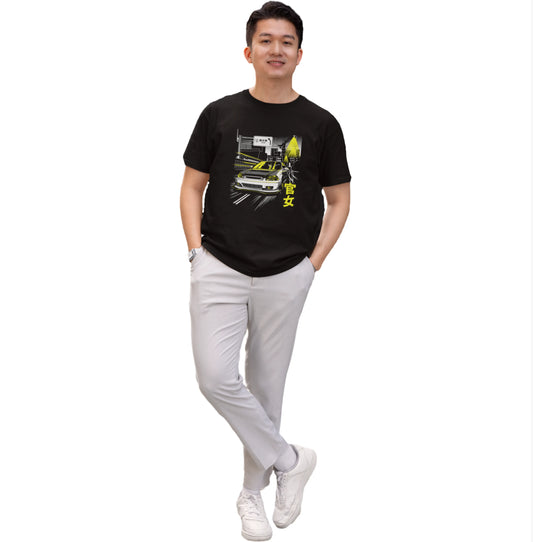 Person wearing a black t-shirt with a graphic design on a white background