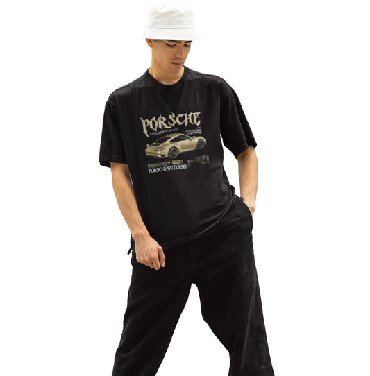 Person wearing a black t-shirt with Porsche logo and car graphic on a white background