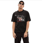 Man wearing a black t-shirt with 'Grand Prix' graphic design on a white background