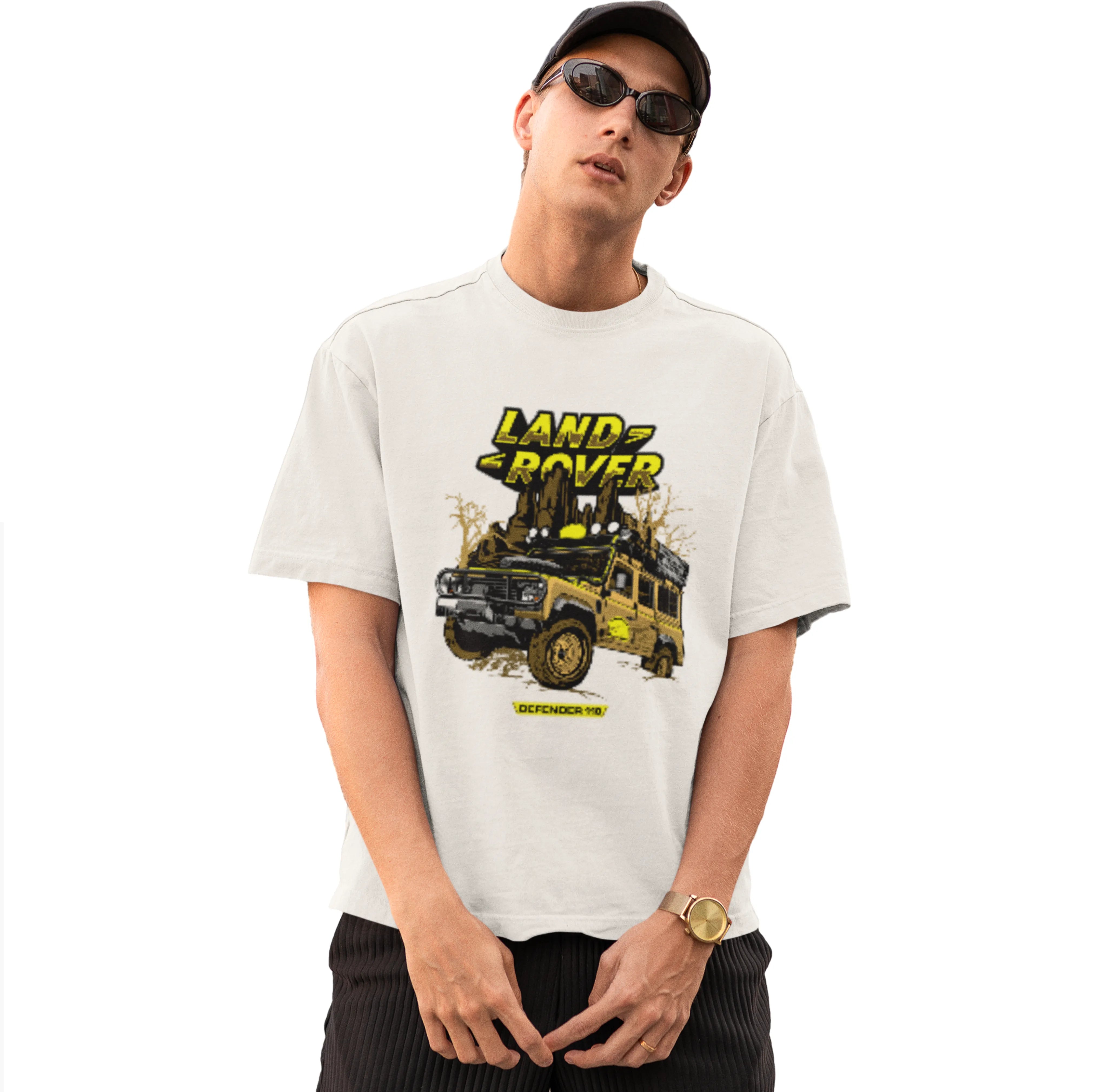 Person wearing a white t-shirt with Land Rover graphic on a white background