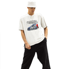 Person wearing a white t-shirt with a graphic design and text on a white background