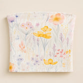Floral-patterned fabric with colorful flowers on a beige background