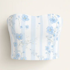 Floral-patterned strapless top with blue flowers on a light background